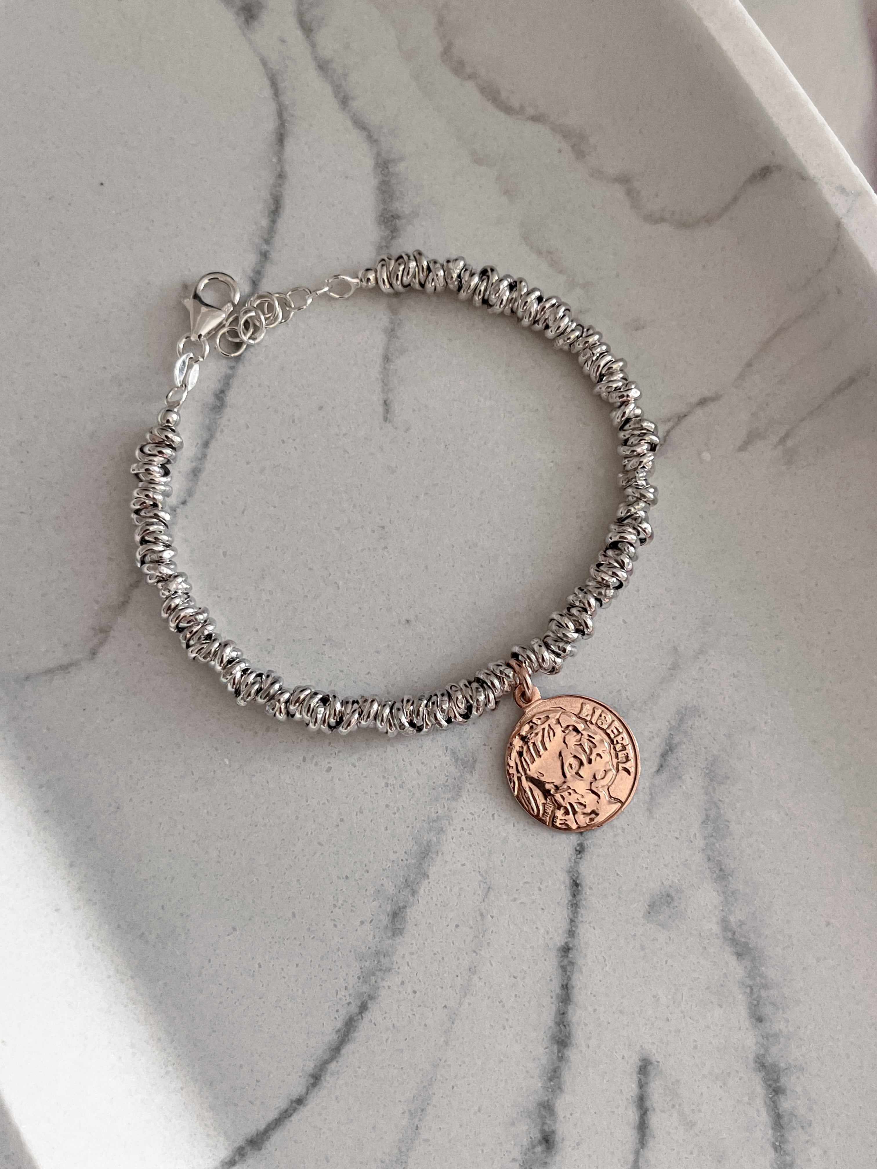 Bracciale moneta portafortuna